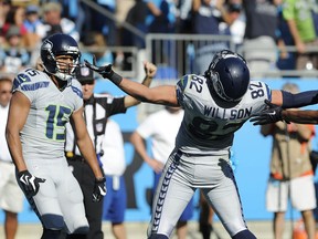 Seattle Seahawks tight end Luke Willson celebrates his game-winning touchdown against the Carolina Panthers Sunday, Oct. 26, 2014, in Charlotte. The Seattle Seahawks won 13-9. (AP Photo/Mike McCarn)