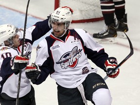 The Windsor Spitfires Markus Soberg and Chris Marchese (right) celebrate a goal in the first period against the Peterborough Petes at the WFCU Centre in Windsor on Thursday, October 9, 2014.                      (TYLER BROWNBRIDGE/The Windsor Star)