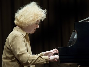 In this file photo, Sara Davis Buechner plays piano in Montreal, Tuesday, June 3, 2014. The classical pianist played with some of the most prestigious orchestras in the United States, winning praise from presidents and capturing awards that pointed to a promising career as one of the best in the world. (THE CANADIAN PRESS)