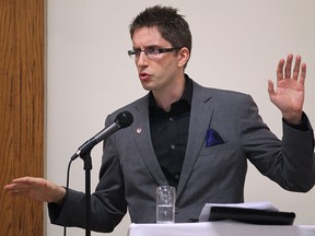 Jordan Brennan, Unifor Canada economist speaks Tuesday. Oct. 21, 2014, on unemployment and poverty in Windsor and Canada. (DAN JANISSE/The Windsor Star)