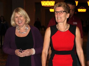 Ontario Premier Kathleen Wynne, right, and Deputy Premier Deb Matthews are shown at Caesars Windsor on Friday, Oct. 17, 2014, attending the Ontario Liberal Party Provincial Council. (DAN JANISSE/The Windsor Star)