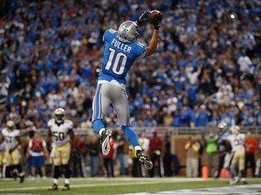 Beer and football have always been a Sunday afternoon combination. Now try something different with your beer next time the Lions' Corey Fuller skies for a late-game touchdown. (Greg Shamus / Getty Images)