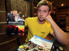 St. Clair College student Matt Deleersnyder, 19, works two jobs in order to pay for costly textbooks and his $11,000 yearly tuition Tuesday November 4, 2014.  Deldersnyder is enrolled in Preservice Fire and Rescue program and paid $150 for Essentials of Fire Fighting. (NICK BRANCACCIO/The Windsor Star)
