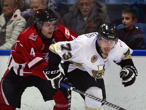 LaSalle Vipers Graham Pickard breaks free of Leamington Flyers Blaine Bechard in first period of Junior B hockey action during Remembrance Day Game at Vollmer Centre, November 5,  2014.  (NICK BRANCACCIO/The Windsor Star)