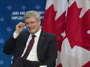 Prime Minister Stephen Harper speaks during a moderated question-and-answer session in Brampton, Ont. on Thursday, October 2, 2014. THE CANADIAN PRESS/Darren Calabrese
