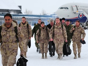 About 35 Canadian Armed Forces members returned to the Edmonton International Airport as part of the final commitment of troops to Afghanistan, December 13, 2013. This support group was deployed anywhere from 6 months to a year overseas. (ED KAISER-EDMONTON JOURNAL)