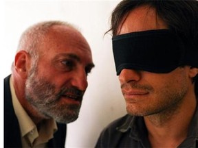 Kim Bodnia, left, and Gael Garcia Bernal in a scene from the film, Rosewater. (AP /Open Road Films, Laith Al-Majali)