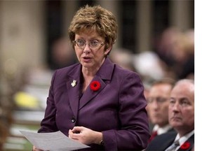 Public Works Minister Diane Finley responds to a question during Question Period in the House of Commons Monday November 3, 2014 in Ottawa. New federal rules that threaten to ban companies convicted of crimes from public contracts could kill jobs and hurt the Canadian economy, warns a study conducted for a powerful business group. THE CANADIAN PRESS/Adrian Wyld