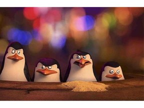 This image released by DreamWorks Animation shows, from left, Kowalski, voiced by Chris Miller, Skipper voiced by Tom McGrath, Rico, voiced by Conrad Vernon and Private voiced by Christpher Knights in a scene from, "The Penguins of Madagascar." (AP Photo/DreamWorks Animation)