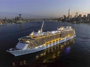This Nov. 10, 2014 photo shows Royal Caribbean cruise line’s new Quantum of the Seas ship sailing into New York Harbor after completing its first trip across the Atlantic. The ship is the first at sea to offer attractions like bumper cars, simulated skydiving and an observation capsule called The North Star, with a bird's eye view 300 feet (91 meters) above the water. (AP Photo/Royal Caribbean)
