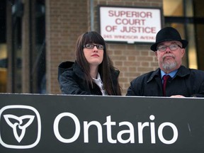 Paralegals Ellisif Harris, left, and Thomas Vanner are now being searched when entering Superior Court of Justice Wednesday November 19, 2014. (NICK BRANCACCIO/The Windsor Star)