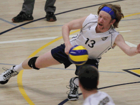 University of Windsor's Greg Simone stretches for a shot against Nipissing University Saturday at the St. Dennis Centre. (DAN JANISSE/The Windsor Star)