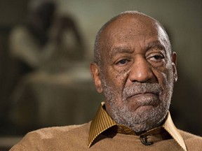 In this photo taken Nov. 6, 2014, entertainer Bill Cosby pauses during an interview about the upcoming exhibit, Conversations: African and African-American Artworks in Dialogue, at the Smithsonian's National Museum of African Art in Washington. The Smithsonian Institution is mounting a major showcase of African-American art and African art together in a new exhibit featuring the extensive art collection of Bill and Camille Cosby. More than 60 rarely seen African-American artworks from the Cosby collection will join 100 pieces of African art at the National Museum of African Art. The exhibit “Conversations: African and African American Artworks in Dialogue,” opens Sunday and will be on view through early 2016. (AP Photo/Evan Vucci)