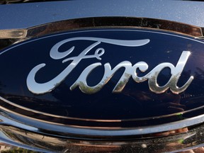 The Ford logo is seen on a truck in Manhattan Beach, California, November 4, 2014.  Ford Motor Co. announced earlier in the day five separate North American recalls covering 202,241 vehicles including one update to a previous recall repair that could result in a loss of steering control.     AFP PHOTO / ROBYN BECKROBYN BECK/AFP/Getty Images