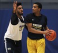University of Windsor's Tyler Persaud, left, and Khalid Abdel-Gabar practise at the St. Denis Centre. (DAN JANISSE/The Windsor Star)