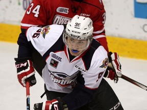 Windsor's Cristiano DIGiancinto, front, turns in front of Owen Sound's Damir Sharipzyanov at the WFCU Centre. (NICK BRANCACCIO/The Windsor Star)