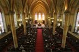 The congregation attends mass at Assumption Church on the last day of masses before it closes, Sunday, Nov. 2, 2014.  (DAX MELMER/The Windsor Star)