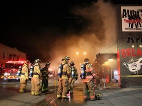 Windsor Fire and Rescue Service on scene of a structure fire at 943 Ottawa St. Saturday morning, Nov. 8. The location's main floor serves as Alibi's Family Grill, the second floor is composed of five rental units and the basement is an art studio. (Twitpic: DAX MELMER/The Windsor Star)