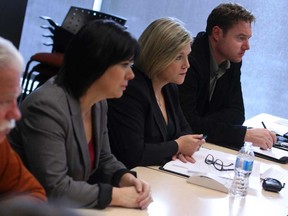 Ontario NDP leader, Andrea Horwath, centre-right, is joined by local MPP's, from left, Percy Hatfield, Lisa Gretzky, and Taras Natyshak as they hold a roundtable discussion regarding the Community Care Access Centre cuts to home care services, Saturday, Nov. 29, 2014.  .    (DAX MELMER/The Windsor Star)