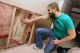 Ben Azzopardi looks at cracks at his parents home on Villa Borghese Drive in Windsor on Friday, November 21, 2014. The family is blaming the cracks and damage on the parkway construction that is happening behind their home. (TYLER BROWNBRIDGE/The Windsor Star)