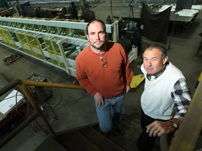Neall Hartwell and Randy Cyr (left) are photographed at R.J. Cyr Co. Inc. in Windsor on Wednesday, November 12, 2014. The company is manufacturing a massive conveyor for the Detroit Renewable Power incinerator.                      (TYLER BROWNBRIDGE/The Windsor Star)