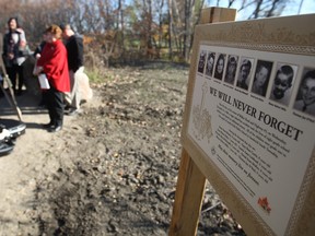 A plaque dedicated to the eight children that died Dec. 21, 1966, after the school bus they were riding in collided with a dump truck, is pictured Sunday, Nov. 2, 2014.  (DAX MELMER/The Windsor Star)