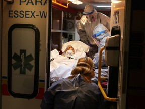 Windsor Essex EMS Paramedics and Windsor Regional Hospital staff take part in a mock ebola drill on November 4, 2014. (JASON KRYK/The Windsor Star)