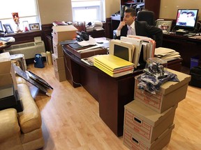 Windsor mayor Eddie Francis pauses while packing up his office Wed. Nov. 19, 2014, at City Hall. (DAN JANISSE/The Windsor Star)