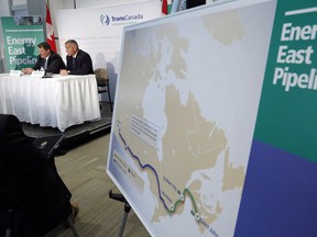 The Energy East pipeline proposed route is pictured as TransCanada officials speak during a news conference in Calgary, on Aug. 1, 2013.  THE CANADIAN PRESS/Jeff McIntosh