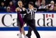 Piper Gilles and Paul Poirier, of Canada, skate during the ice dance short dance program at Skate Canada International in Kelowna, B.C., on Oct., 31, 2014. THE CANADIAN PRESS/Jonathan Hayward