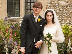 Eddie Redmayne as Stephen Hawking, left, and Felicity Jones as Jane Wilde in a scene from "The Theory of Everything." (AP Photo/Focus Features, Liam Daniel)