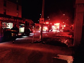 Fire crews battle an apartment fire in the 800 block of Ouellette Avenue Friday, Nov. 21, 2014.