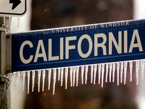 Ice coats a street sign in Windsor, Ont. in this 2002 file photo. (Nick Brancaccio / The Windsor Star)