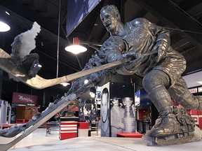 A statue of Detroit Red Wing legend Gordie Howe  is shown Wed. Nov. 19, 2014, at the Joe Louis Arena in Detroit, MI. (DAN JANISSE/The Windsor Star)