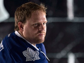 Toronto Maple Leafs Phil Kessel pauses during a photo shoot at training camp in Toronto on Thursday, September 18, 2014. After reportedly brushing off a reporter after a 6-2 loss in Buffalo on Saturday night, Kessel was greeted by a large media scrum after Monday's practice at Air Canada Centre. THE CANADIAN PRESS/Chris Young