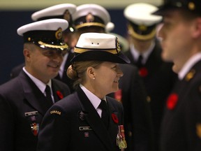 Reviewing Officer Captain Marta Mulkins inspects the H.M.C.S Hunter Naval Reserves during the Change of Command Parade at H.M.C.S Hunter, Saturday, Nov. 1, 2014.  LCdr Robert Head is replacing Cdr Dan Manu-Popa.  (DAX MELMER/The Windsor Star)