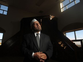 Imam Abdullah Hammoud, pictured at the Al-Hijra Mosque Saturday, Nov. 1, 2014, discusses his relationship with Mohamed El Shaer, who is one of two men from Windsor recently charged by the RCMP for passport fraud. Hammoud only had occasional contact with Shaer and has never met Ahmed Waseem, the other local man charged by RCMP.  Both Shaer and Waheem are considered 'high-risk travellers' by the RCMP. Their whereabouts are currently unknown.  (DAX MELMER/The Windsor Star)