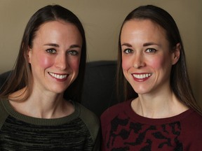 Twins Allison Knight (L) and Lauren Knight are shown on Friday, Nov. 28, 2014, at their Windsor, ON. residence. The mirror image twins were recently featured in a television documentary.  (DAN JANISSE/The Windsor Star)