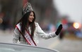Priya Madaan, reigning Miss Canada 2014 and a nursing student at the University of Windsor, leads the Downtown Windsor BIA's Holiday Parade during Winter Fest, Saturday, Nov. 29, 2014.  Madaan was this year's Grand Marshal for the parade.   (DAX MELMER/The Windsor Star)