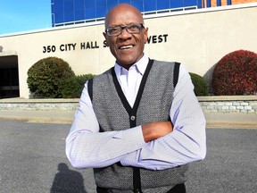 Paul Carter stands in front of Windsor City Hall on Monday, Nov. 10, 2014. After working for the city for 47 years Carter is considering retiring soon. He currently works with mayor Eddie Francis whose term is over in a few weeks. (DAN JANISSE/The Windsor Star)