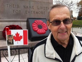Windsor's Jacques Anctil, at downtown Cenotaph Tuesday Nov. 4, 2014, favours a national statutory holiday on Nov. 11 Remembrance Day. Doug Schmidt/The Windsor Star