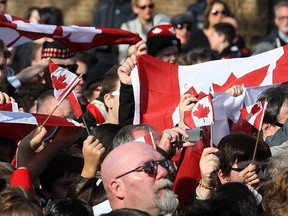 Canadian flags were everywhere at the downtown Remembrance Day ceremony on Tuesday, Nov. 11, 2014, in Windsor, ON. (DAN JANISSE/The Windsor Star)