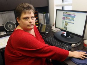 Jodi Clapp is photographed at her office in Windsor on Wednesday, November 19, 2014. Clapp was almost the victim of a real estate scam but wisely didn't send any cash.                    (TYLER BROWNBRIDGE/The Windsor Star)