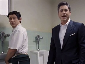 This image taken from video provided by DirecTV shows actor Rob Lowe, right, and "painfully awkward" Rob Lowe in an ad for the satellite television company. Shy bladder sufferers want DirecTV to stop airing the television ad, in which "painfully awkward" Rob Lowe says that he can't urinate in public. (AP Photo/DirecTV)