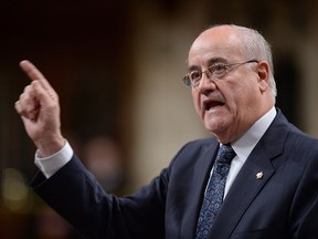 Minister of Veterans Affairs Julian Fantino responds to asks a question during question period in the House of Commons on Parliament Hill in Ottawa on Tuesday, November 18, 2014. (THE CANADIAN PRESS/Sean Kilpatrick)