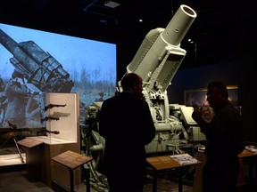 A German Howitzer, 21 cm Morser 10, is displayed during the media preview of the new exhibit 'Fighting in Flanders- Gas. Mud. Memory.' at the Canadian War Museum in Ottawa on Thursday, November 6, 2014. The new exhibition explores the Canadian experience in Belgium during the First World War and runs from November 7, 2014 to April 26, 2015. THE CANADIAN PRESS/Sean Kilpatrick