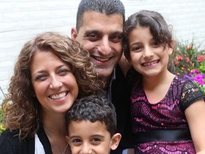 May 14, 2014: Michelle Prince, Mayor Eddie Francis and their children, Sienna and Phoenix, pose for a family portrait at their Windsor home. Says Prince: the kids “might miss being famous,” after their father’s term as mayor concludes. (JASON KRYK / Windsor Star files)