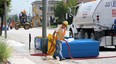 In this July 7, 2014 file photo, construction crews begin the work on Wyandotte Street in Walkerville. The street will be closed for the next couple months as crews replace waterlines and improve streets and sidewalks. (Tyler Brownbridge / Windsor Star files)