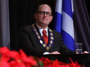 The chain off office might be new to Windsor Mayor Drew Dilkens, but he's had enough experience on city council to know you can't avoid questions by saying you're not up on issues. (NICK BRANCACCIO/The Windsor Star)