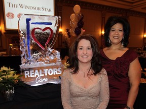 Heather Holdship and Anna Vozza attend the Windsor-Essex County Association of Realtors at the Ciociaro Club December 5, 2014.  (NICK BRANCACCIO/The Windsor Star)